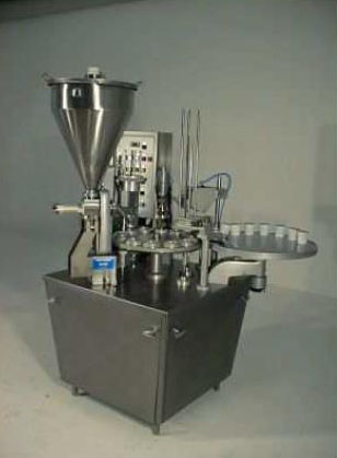 מכונת מילוי וסגירת גביעים מתוצרת HAMBA 